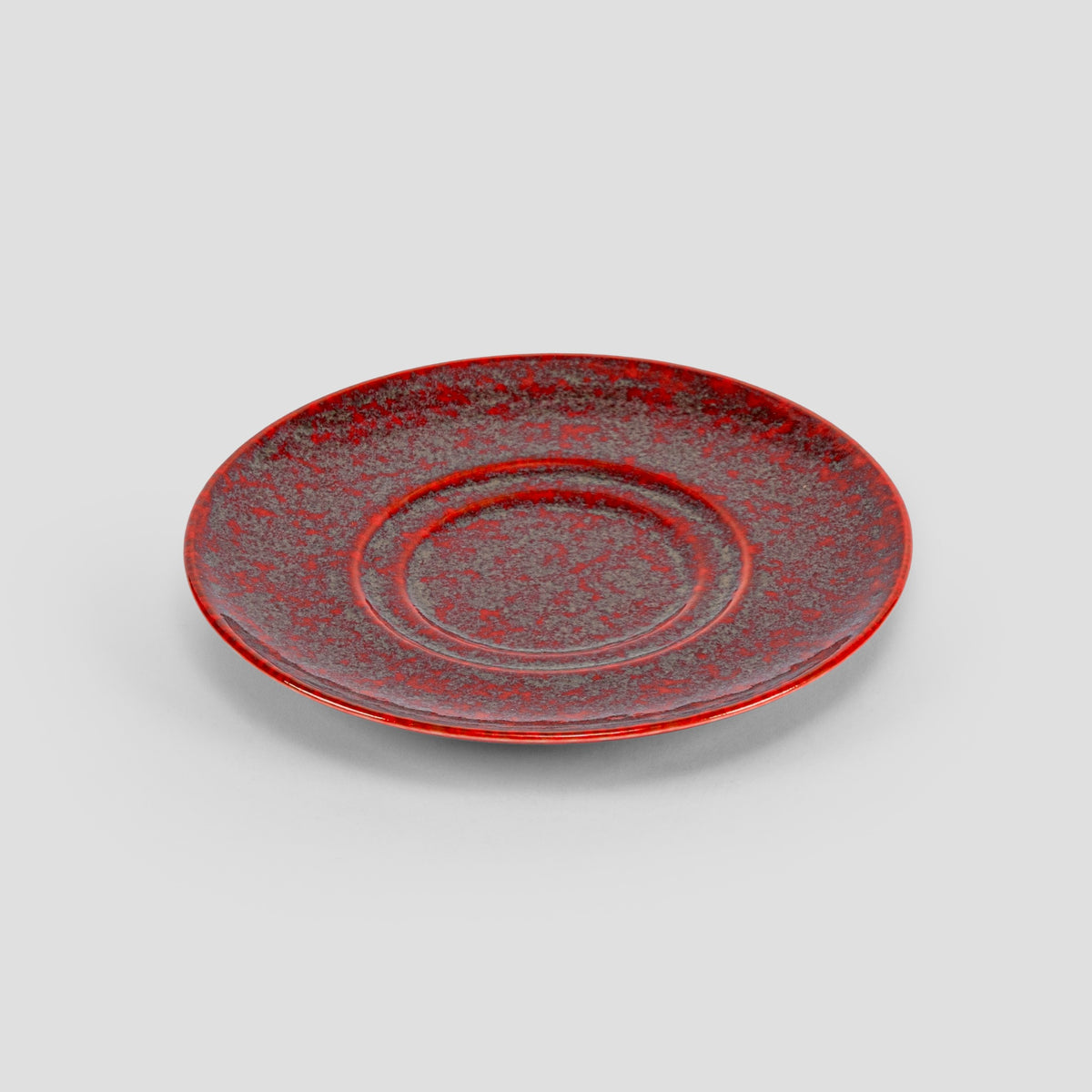 Homura matched saucer showing its unrepeatable reactive glaze pattern