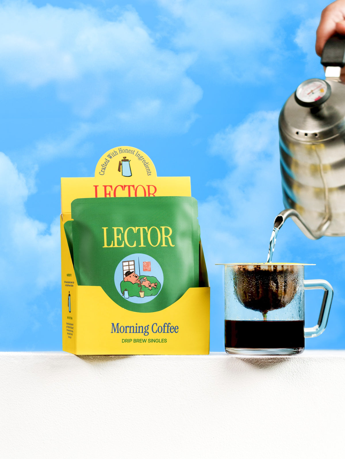The Lazy Dog drip brew coffee box — coffee brewing against a blue sky