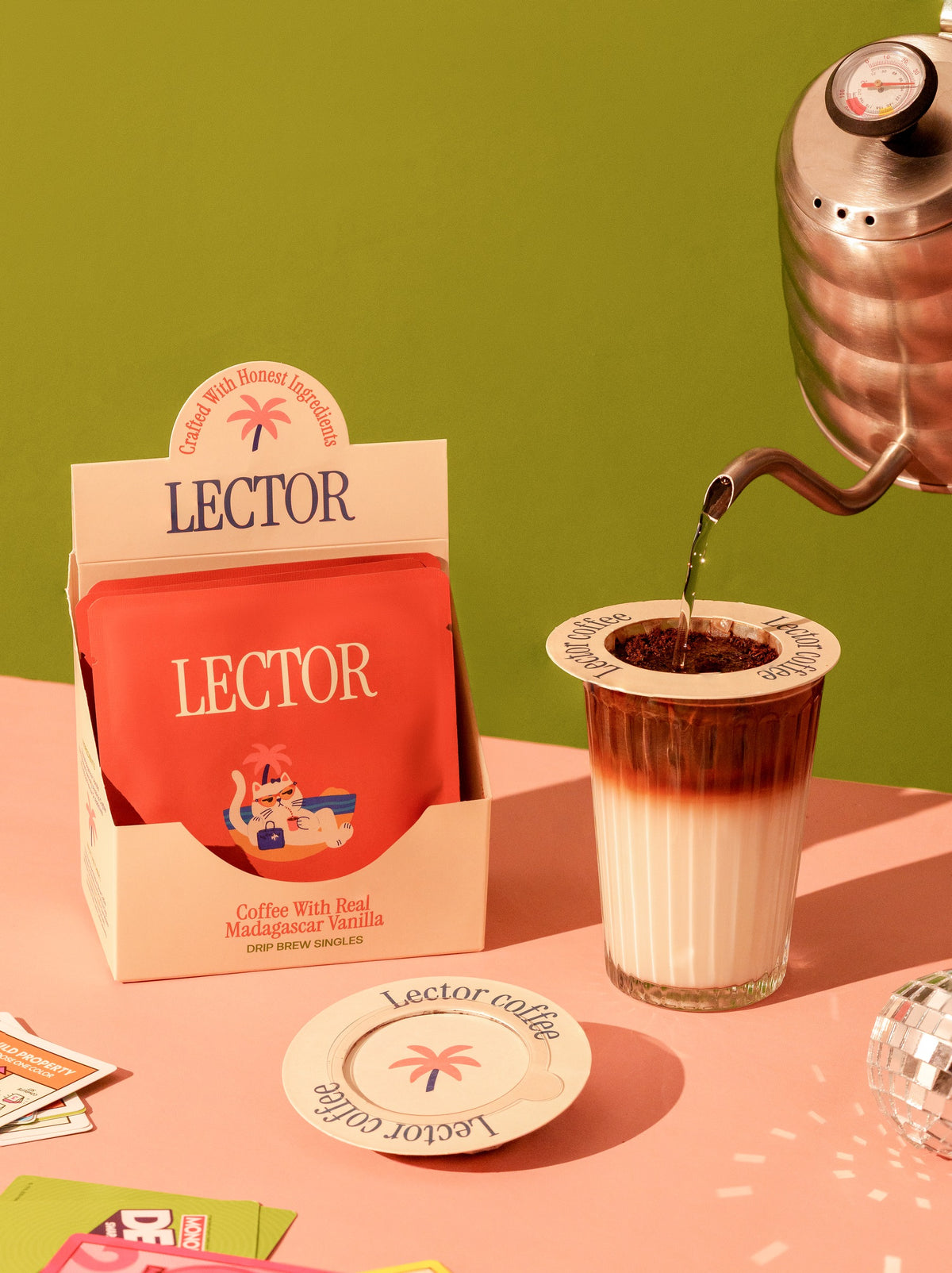The Sassy Cat drip brew coffee box — coffee brewing on a peach tabletop